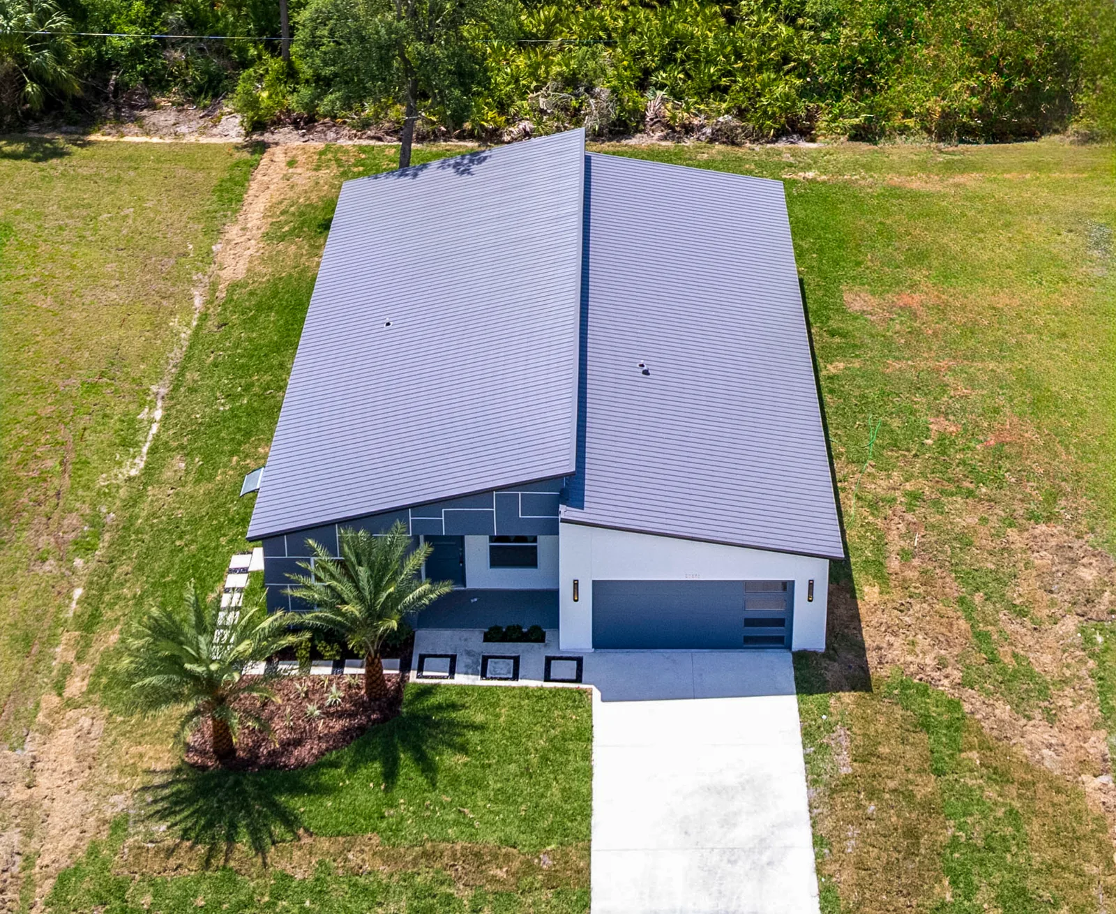 Aerial photograph of a completed CyberHouse 7 in its Southwest Florida neighborhood